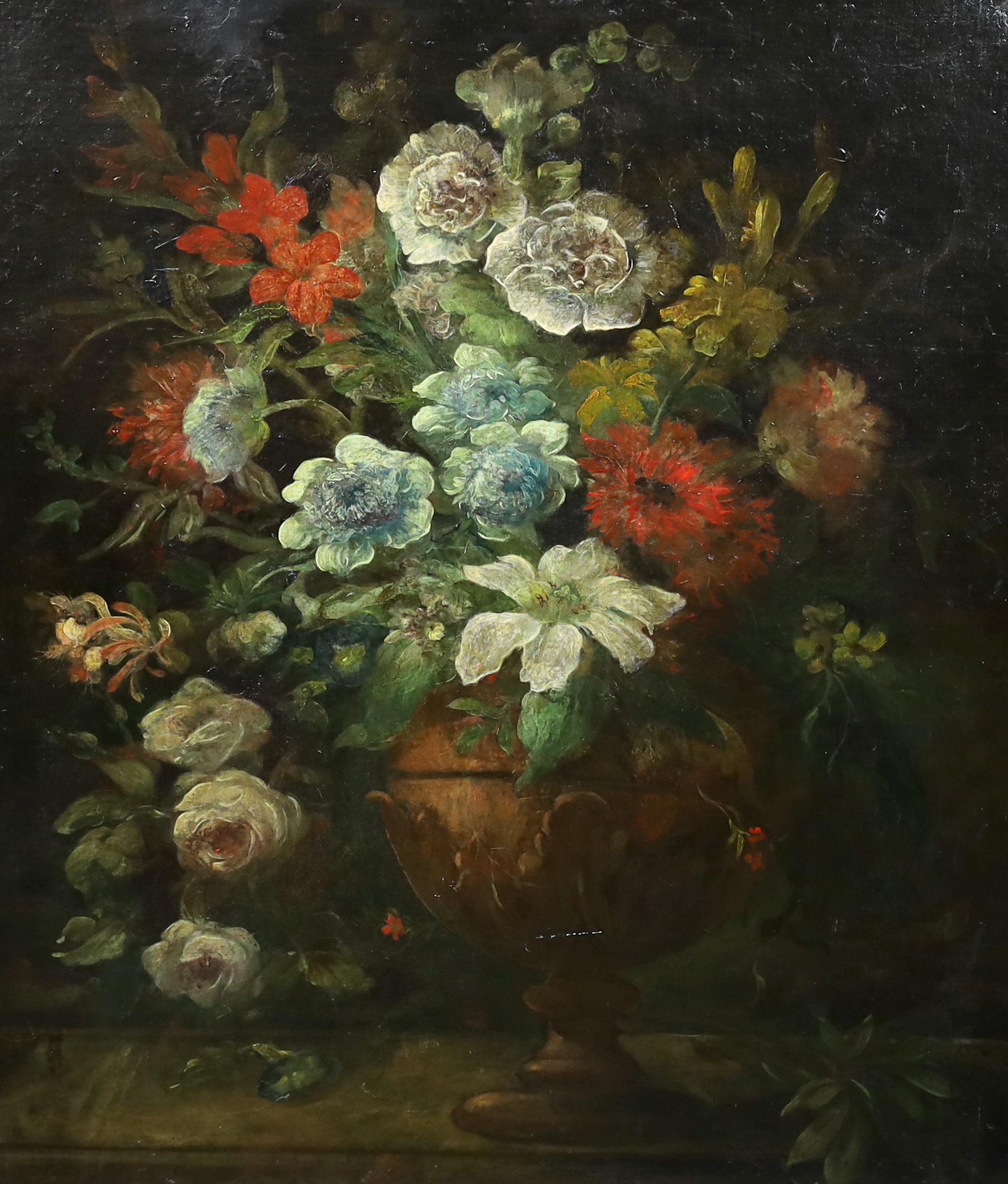 19th century Continental School , 17th century style still life of flowers in a vase upon a ledge, oil on canvas laid on board, 87 x 74cm
